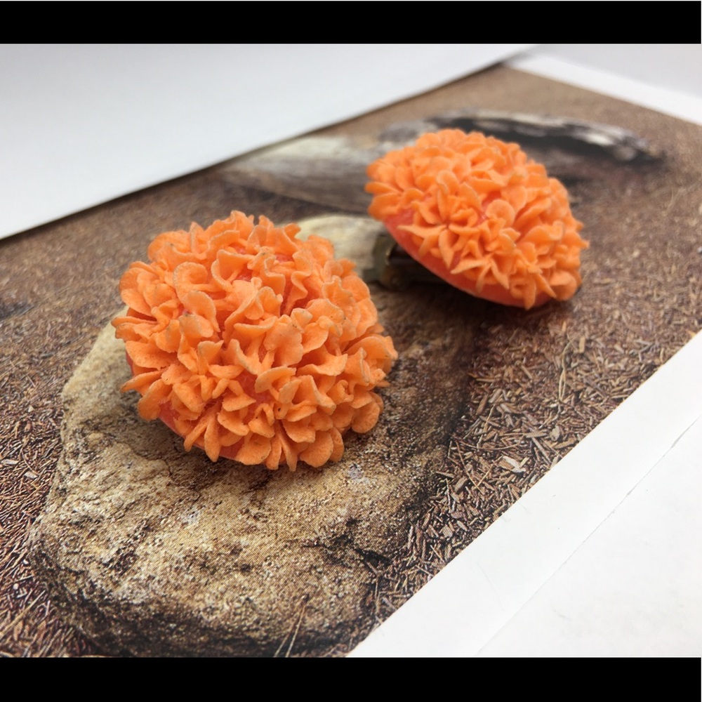 Adoring vintage handcrafted Marigold clip earrings